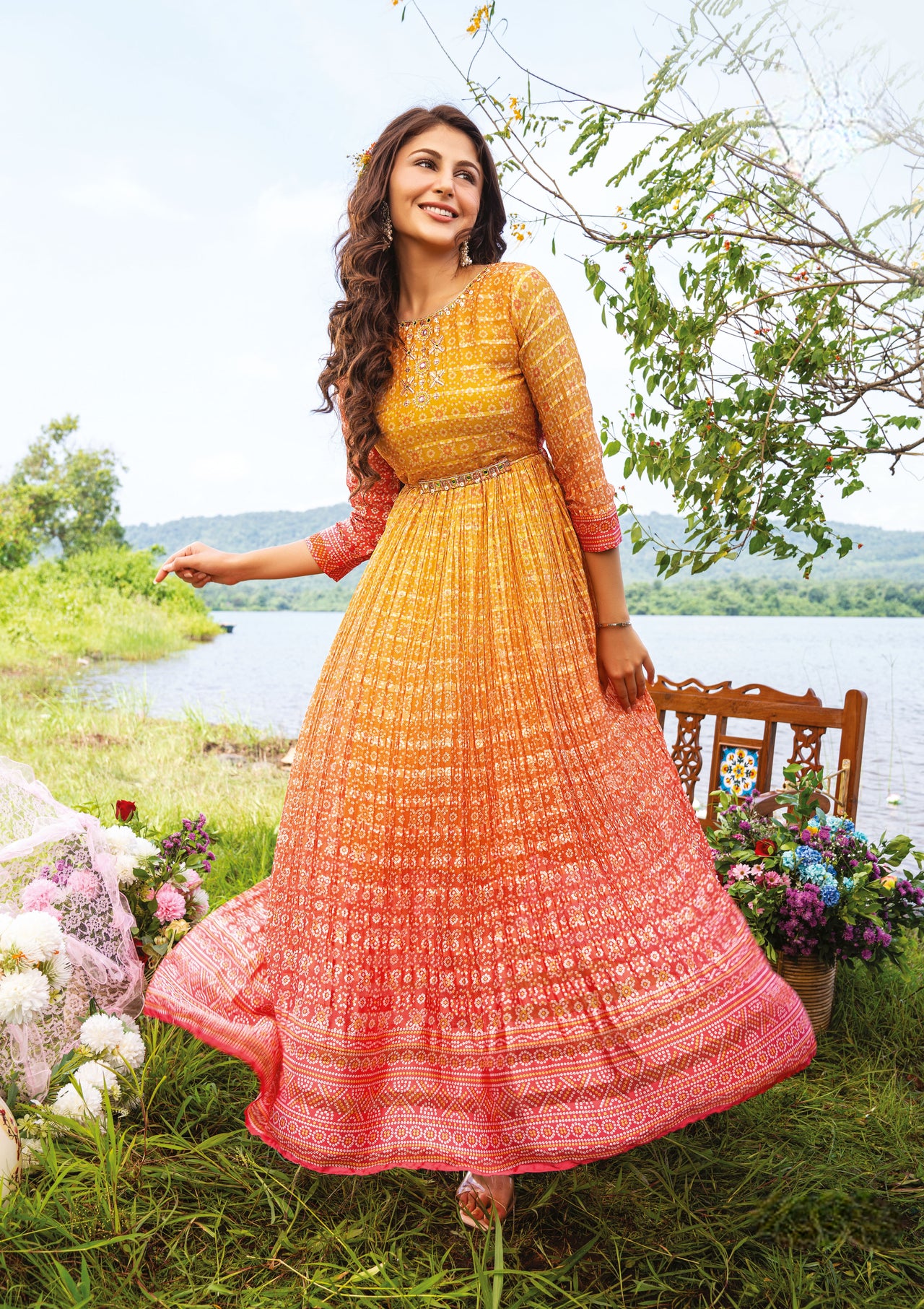 YELLOW PURE GEORGETTE FLARED DESIGNER GOWN WITH SATIN STRIPS