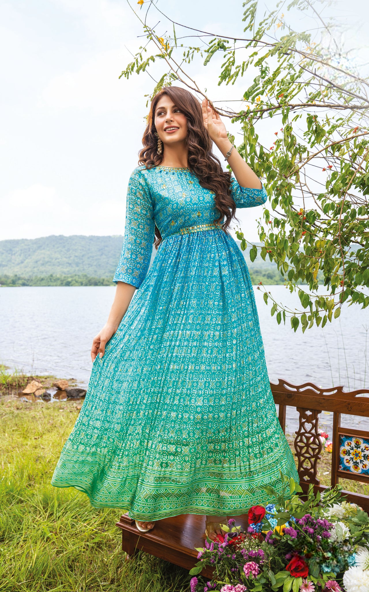 BLUE PURE GEORGETTE FLARED DESIGNER GOWN WITH SATIN STRIPS