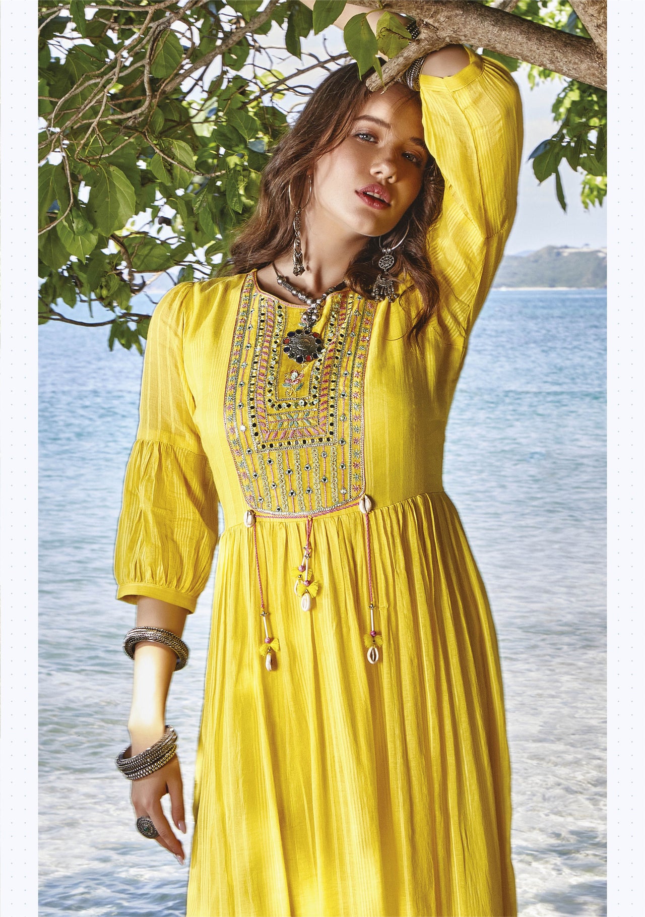 YELLOW MUL COTTON GOWN WITH BEAUTIFUL EMBROIDERY AND MIRRORWORK